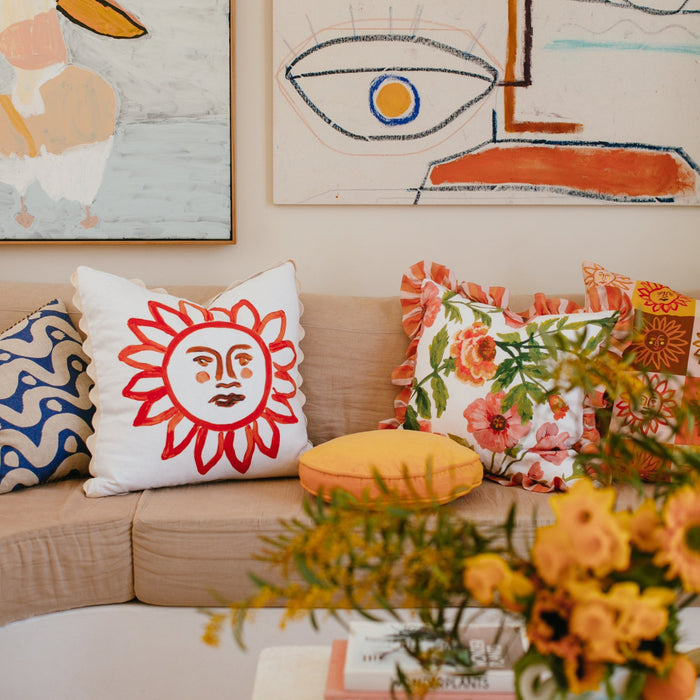 jumbled online x bonnie and neil here comes the sun cushion collaboration. A beautiful hand painted red sun, on a feather filled linen cushion.