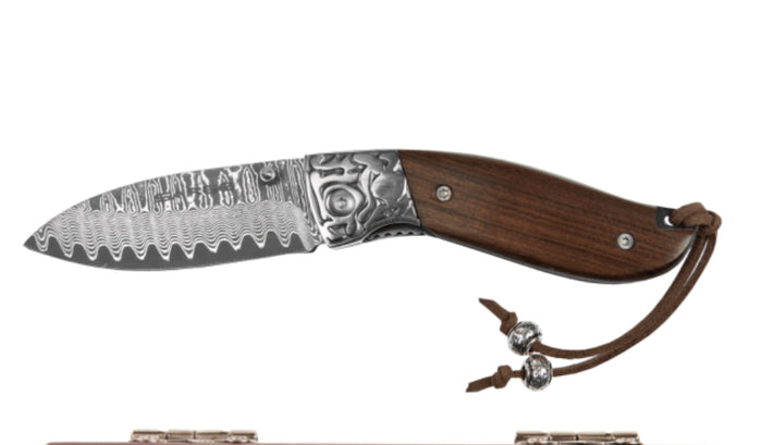 Fox-Damascus folder with decorative bolsters