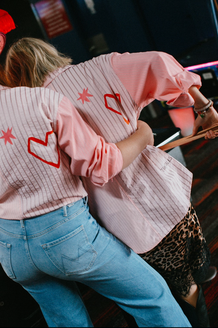 jumbled the tales lucky club shirt womens stripe pink collar button up star swan four leaf clover fun bright fashion australia orange nsw collaboration oversized cuff relaxed front pocket weekend wear workwear tenpin bowling pool cowboy denim jeans boots night out heart love red
